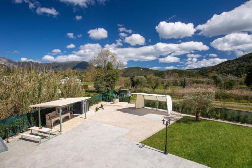 a park with a pavilion and a picnic table at Valley House in Vasiliki