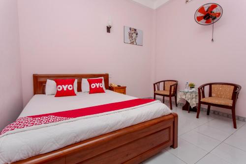 Postel nebo postele na pokoji v ubytování OYO 962 Tulip Motel