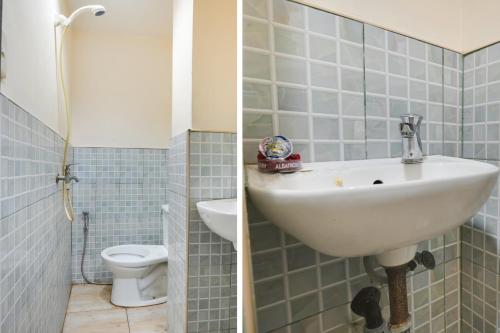 a bathroom with a sink and a toilet at OYO 912 Fb Suites in Bugo