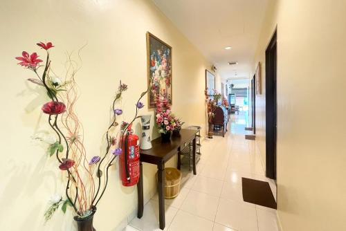 Fotografie z fotogalerie ubytování OYO 90369 Safari Hotel Lumut v destinaci Kampong Pundut
