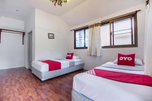 Postel nebo postele na pokoji v ubytování Piyapruk Resort