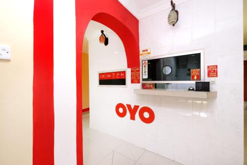 TV a/nebo společenská místnost v ubytování Super OYO 720 Corridor Hotel 2