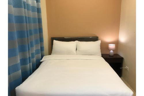 Postel nebo postele na pokoji v ubytování Guest Hotel