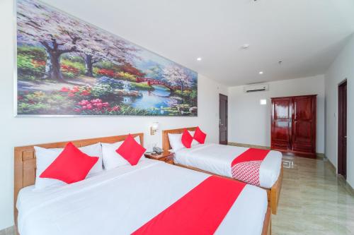 Voodi või voodid majutusasutuse Capital O 215 An Duc Hotel Da Nang toas