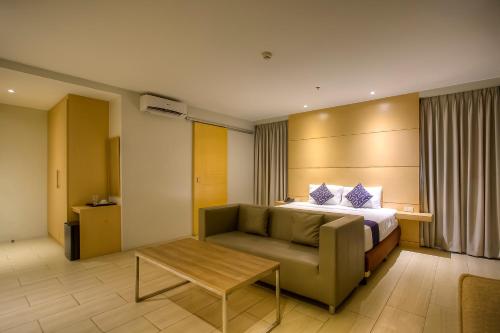 Posezení v ubytování Capital O 827 Speciale Hotel