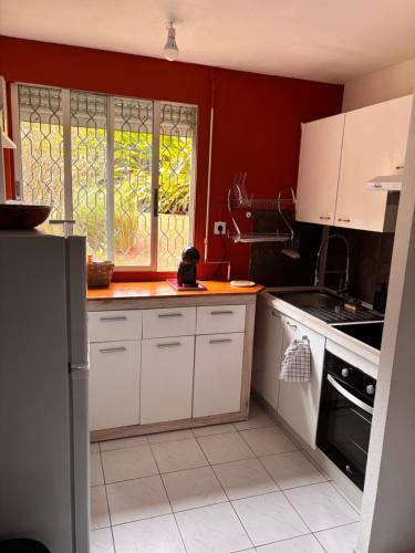 Kuchyň nebo kuchyňský kout v ubytování Appart Milena T2 cosy et calme