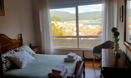 En Muros, céntrico, amplio, luminoso, vistas al mar