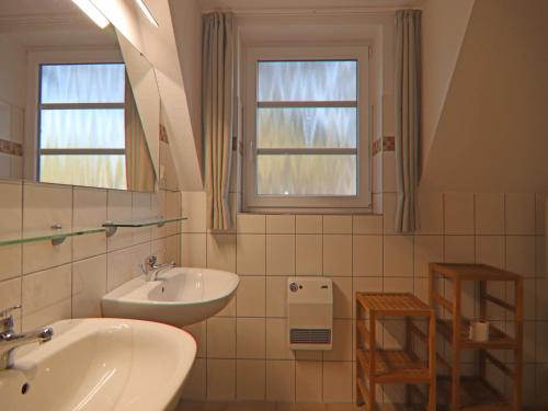 Koupelna v ubytování Reihenhaus Dünenwaldhaus in Trassenheide