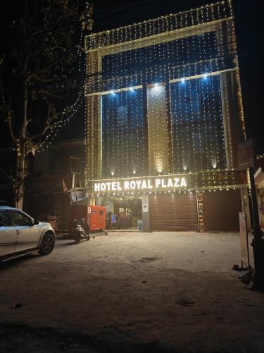a hotel is lit up at night with lights at Hotel Royal Plaza in Rishīkesh