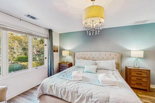 Ένα ή περισσότερα κρεβάτια σε δωμάτιο στο Oyster Catcher 4