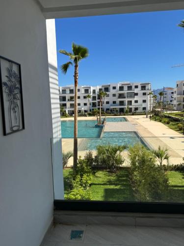 a view of a swimming pool from a building at Casas Del Mar Cabo N in Martil