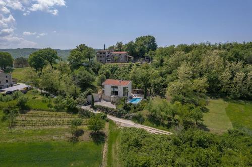 an aerial view of a house in a field at Villa Le Grand Cru in Motovun