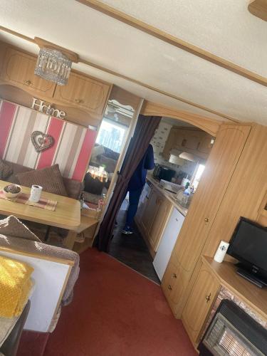 an aerial view of an rv kitchen and living room at Summerlands caravan park, p29 in Skegness