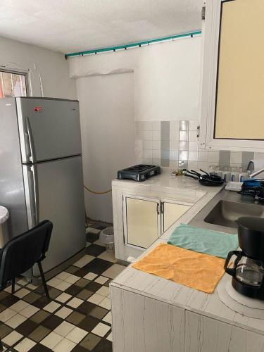 Kuchyň nebo kuchyňský kout v ubytování Hostal Familiar