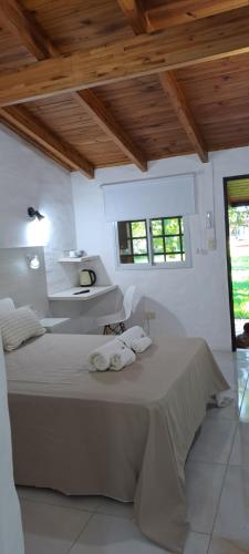 Postel nebo postele na pokoji v ubytování Ex Hostal del Parque