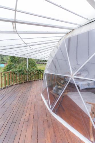 Un balcón o terraza de Cinco Elementos