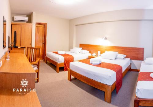 Postel nebo postele na pokoji v ubytování Hoteles Paraiso TRUJILLO