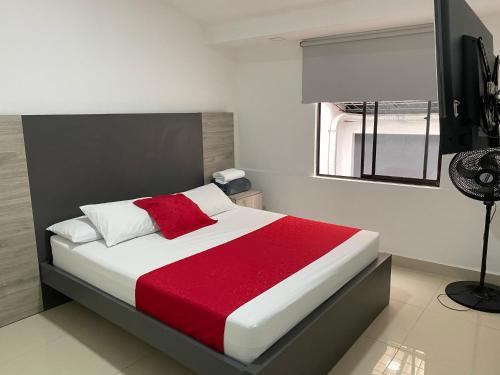 Postel nebo postele na pokoji v ubytování Hotel Ciento Once Boutique Laureles
