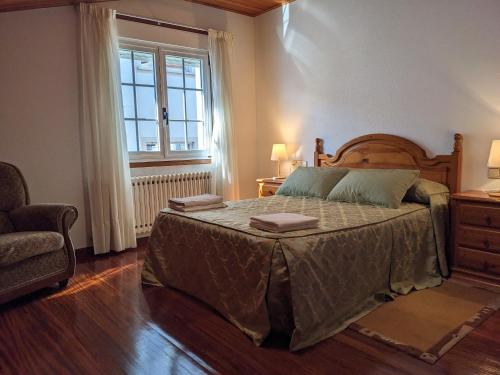 Ένα ή περισσότερα κρεβάτια σε δωμάτιο στο Casa Filomena