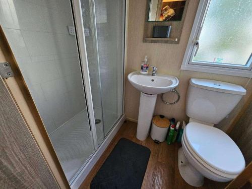 Ένα μπάνιο στο Jayden 3 bed balcony