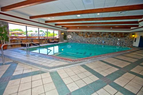 a large swimming pool in a building at Carson Valley Inn in Minden