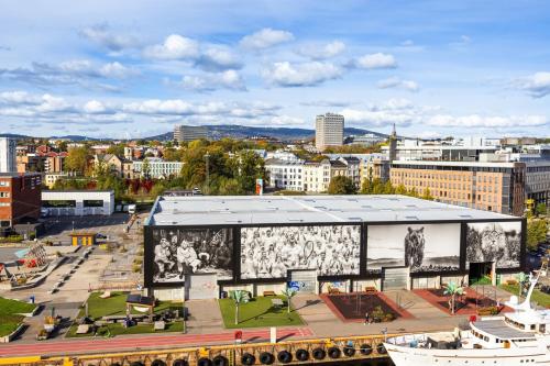 a building with a mural on it in a city at Sea Apartment in Oslo