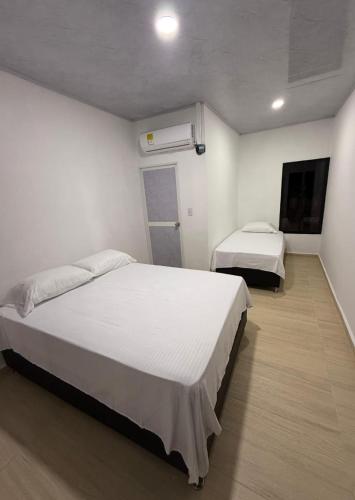 Letto o letti in una camera di La Casa del Marino