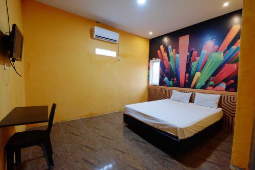 Кровать или кровати в номере Hotel O Homestay Harapan Syariah Bulukumba Near Bulukumba