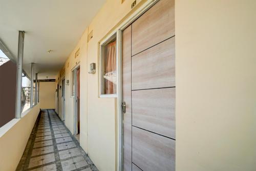 Фотография из галереи OYO Life 93300 Homestay Puri Anggrek Syariah - Wage в городе Сидоарджо