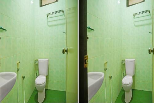 Un baño de Collection O 92690 Hotel Limas