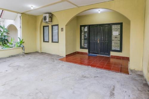 Eine Fassade oder ein Eingang zu Hotel O Budi Residence 1