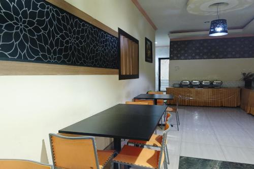 Kuchyň nebo kuchyňský kout v ubytování OYO 93953 Kost Tamara Near Kantor Desa Sengka