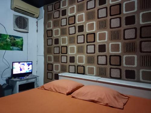 Кровать или кровати в номере Hotel O Grand Village