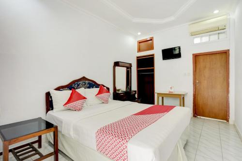 Hotel O Ratuにあるベッド