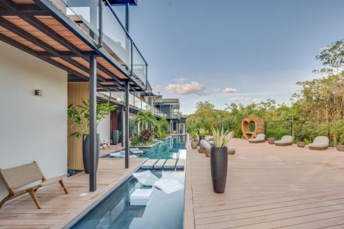 an image of a house with a swimming pool at The Bungalows #8 - Boutique Hotel in Flamingo Beach - Top Level Studio in Playa Flamingo