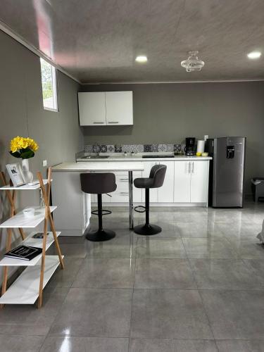 Kuchyň nebo kuchyňský kout v ubytování Apartamento Einoah