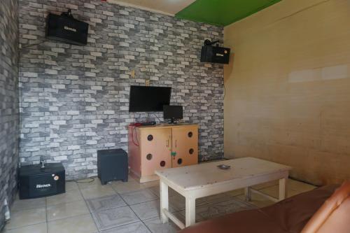 Φωτογραφία από το άλμπουμ του Hotel O Wisma Melyro Syariah Near Yamaha - Thamrin Brothers Cabang Muara Dua σε Muaradua