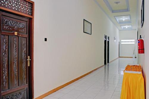 Photo de la galerie de l'établissement Capital O 90417 Hotel Batu Suli Internasional, à Palangka Raya