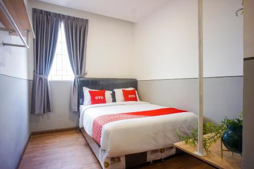 Postel nebo postele na pokoji v ubytování SUPER OYO 93064 Alhesa Residence