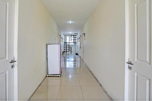Фотография из галереи Hotel O Garden Homestay 3 Merlion в городе Lontar