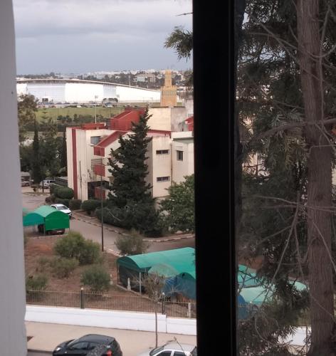 a view of a city from a window at Dar Lamine Duplex in Rabat