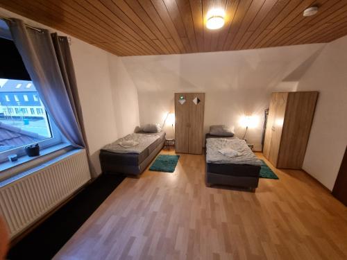 Postel nebo postele na pokoji v ubytování Haus Ruhrpott