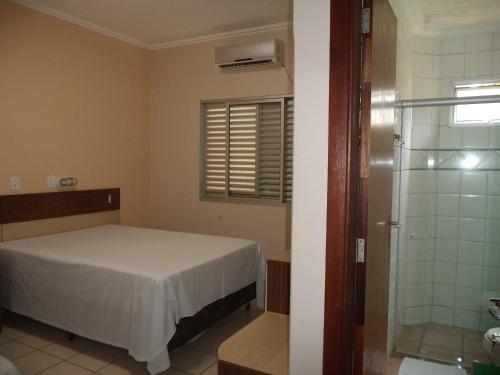 Cama o camas de una habitación en Villa Verde Hotel