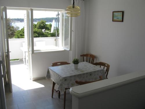 Apartments by the sea Barbat, Rab - 24217