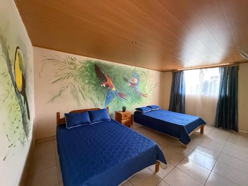 Postel nebo postele na pokoji v ubytování La Tigra Mountain House