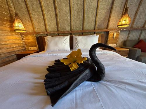 Een bed of bedden in een kamer bij Bale Baba private pool villa