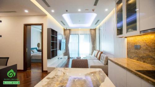 a living room with a couch and a table at Thuý Doji Diamond Apartment in Hai Phong