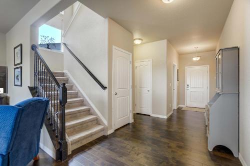 a hallway with stairs in a home at Clear Estate Spacious Retreat with BBQ & Views in Pikeview