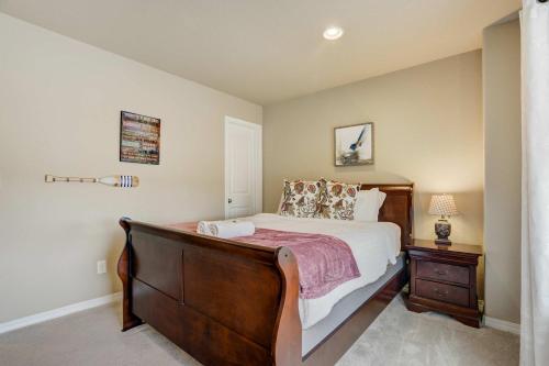 a bedroom with a bed and a wooden dresser at Clear Estate Spacious Retreat with BBQ & Views in Pikeview