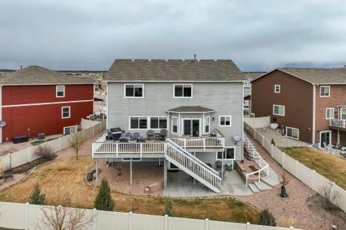 an aerial view of a house with a porch at Clear Creek Cozy Getaway with Private Patio in Pikeview